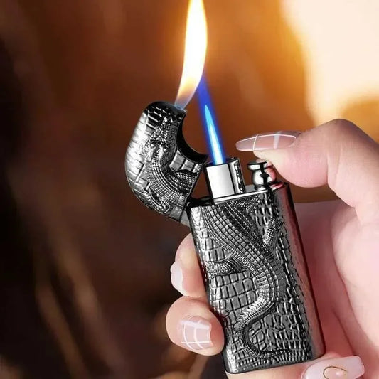 Hand holding a decorative lighter with a flame