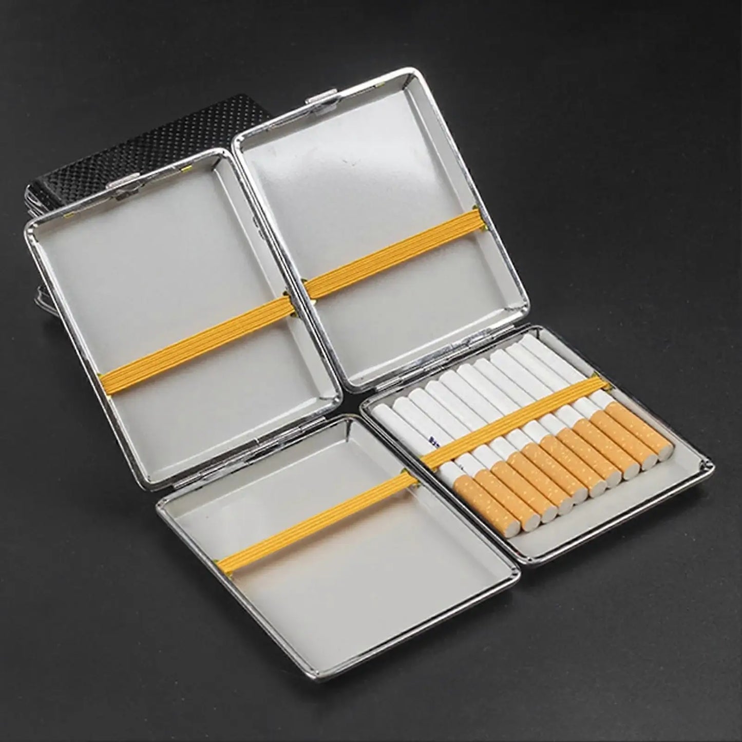Cigarette case with cigarettes on a dark background