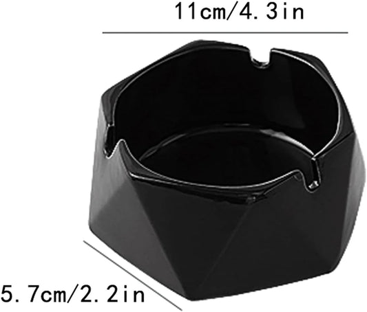 Black ashtray with measurements on a white background