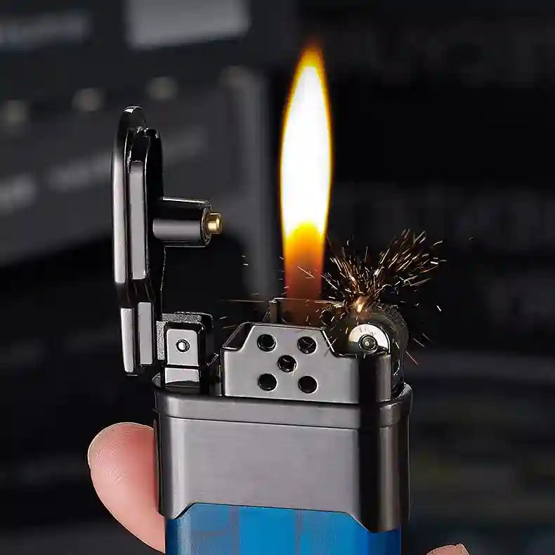 Hand holding a blue and black lighter with a flame against a blurred background