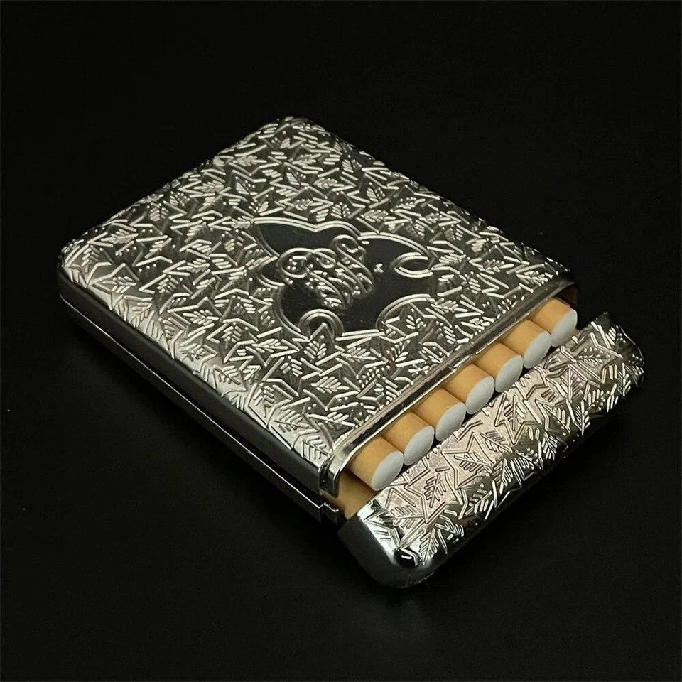 Silver embossed cigarette case with visible cigarettes on a black background