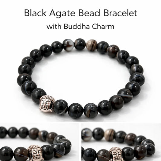 Black agate bead bracelet with Buddha charm on a white background