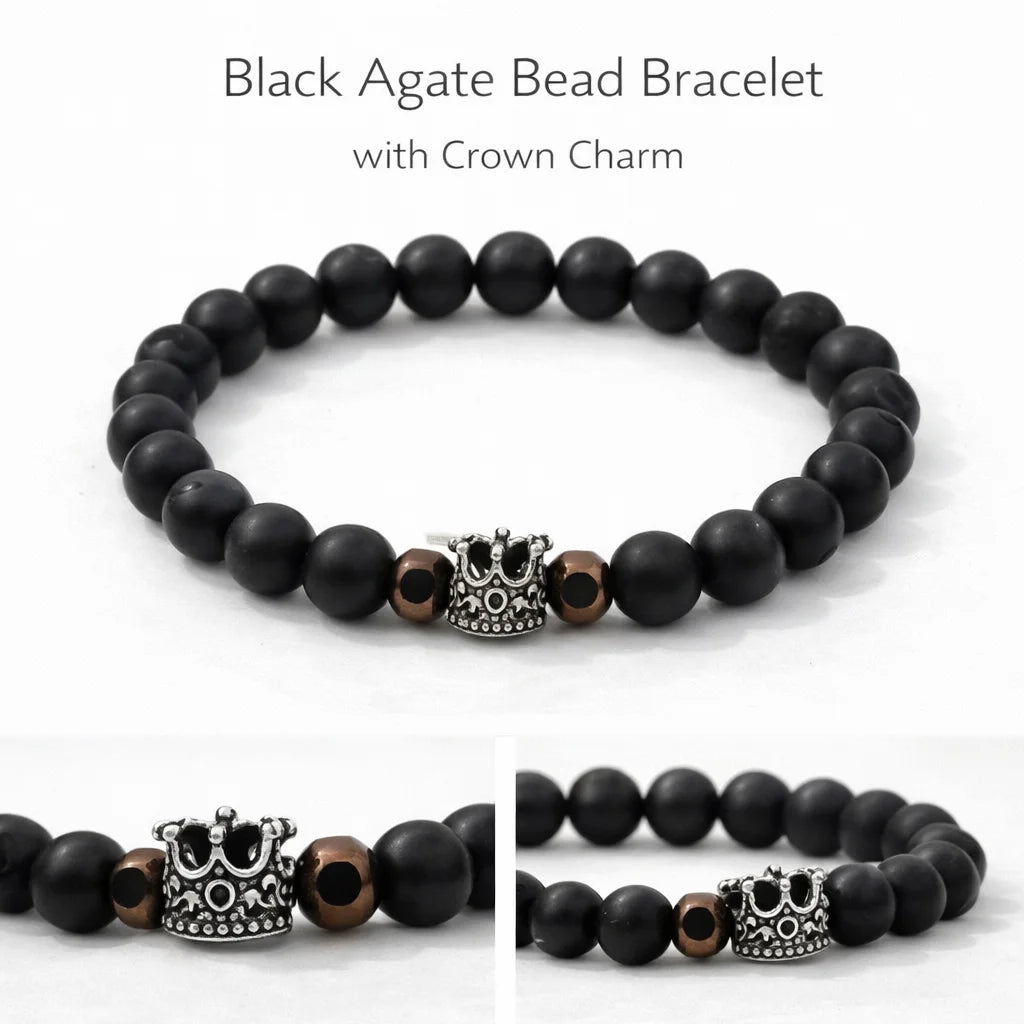 Black agate bead bracelet with crown charm on a white background