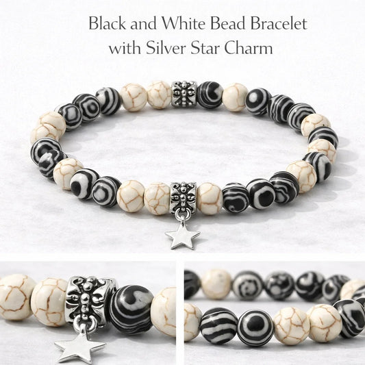 Black and white bead bracelet with silver star charm on a light background