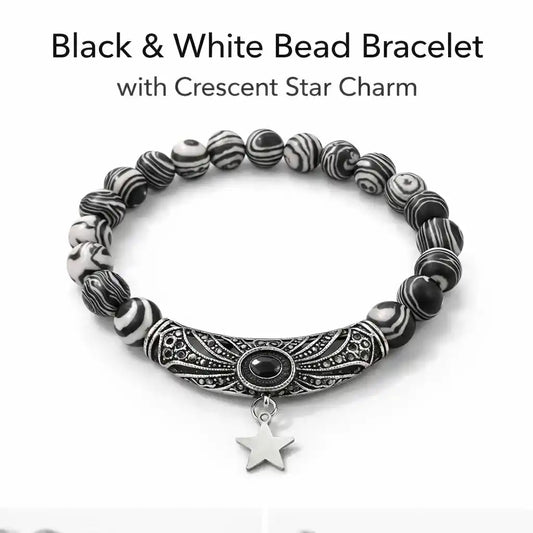 Black and white bead bracelet with crescent star charm on a white background