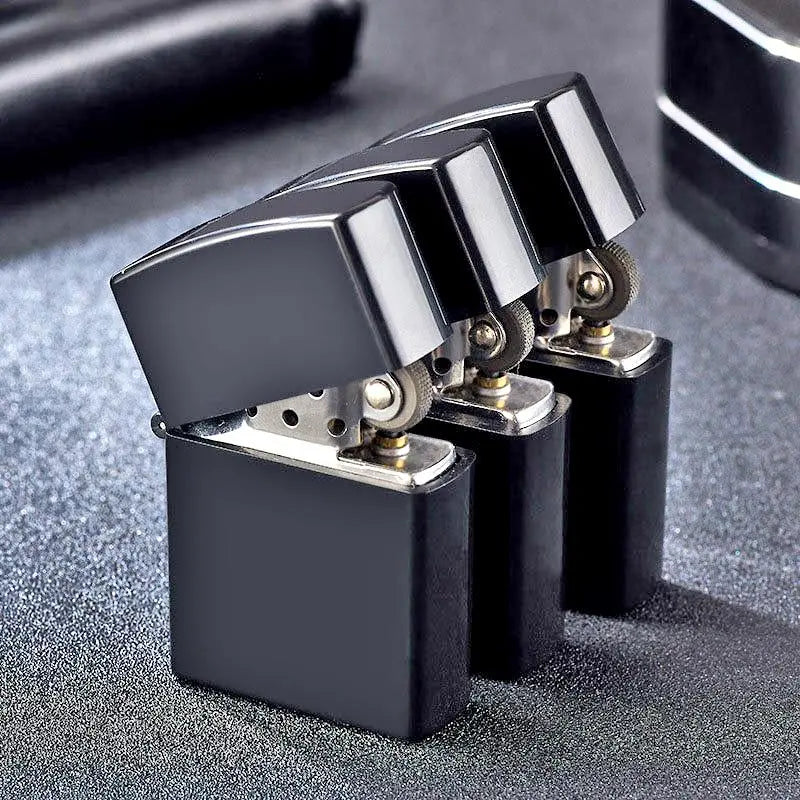 Black and silver zippo lighter on a textured surface