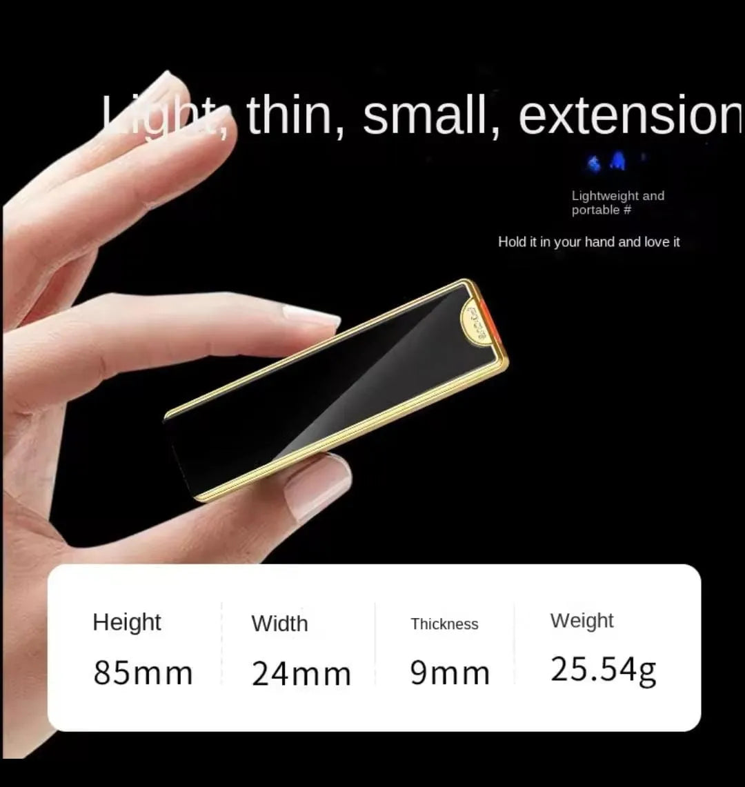 Hand holding a small black and gold device with specifications displayed.