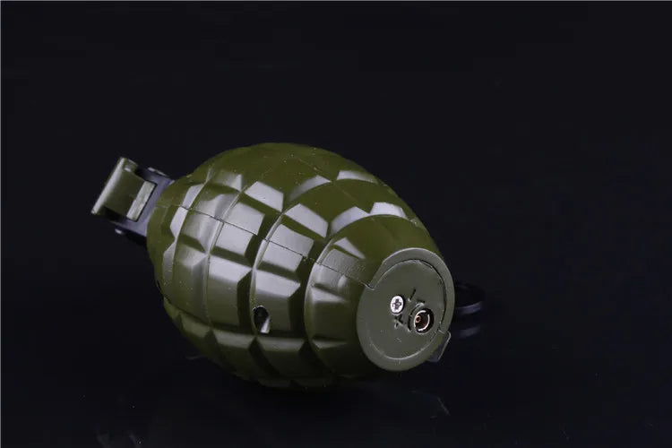 Green grenade lighter on a black background
