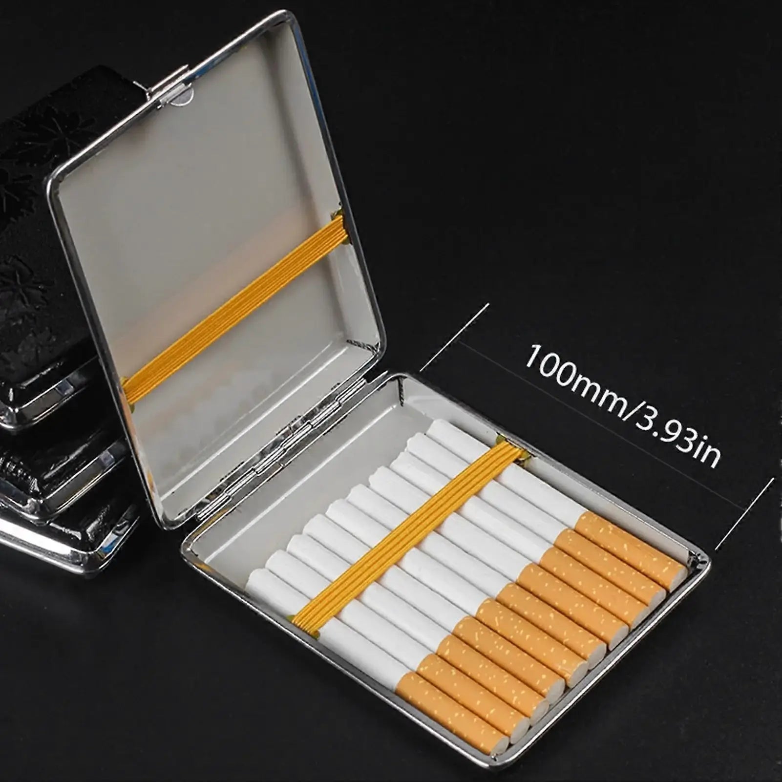 Cigarette case with cigarettes inside, showing dimensions on a black background