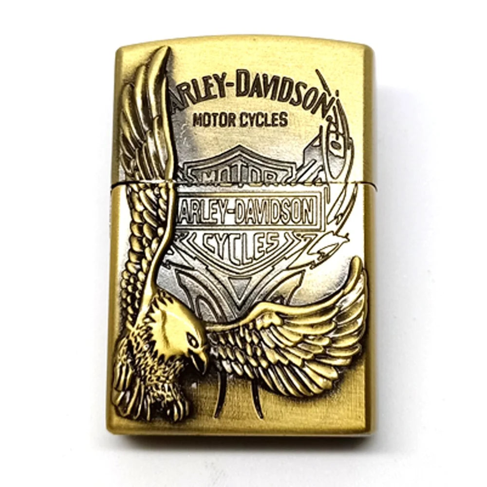 Gold lighter with Harley-Davidson logo and eagle design on a white background