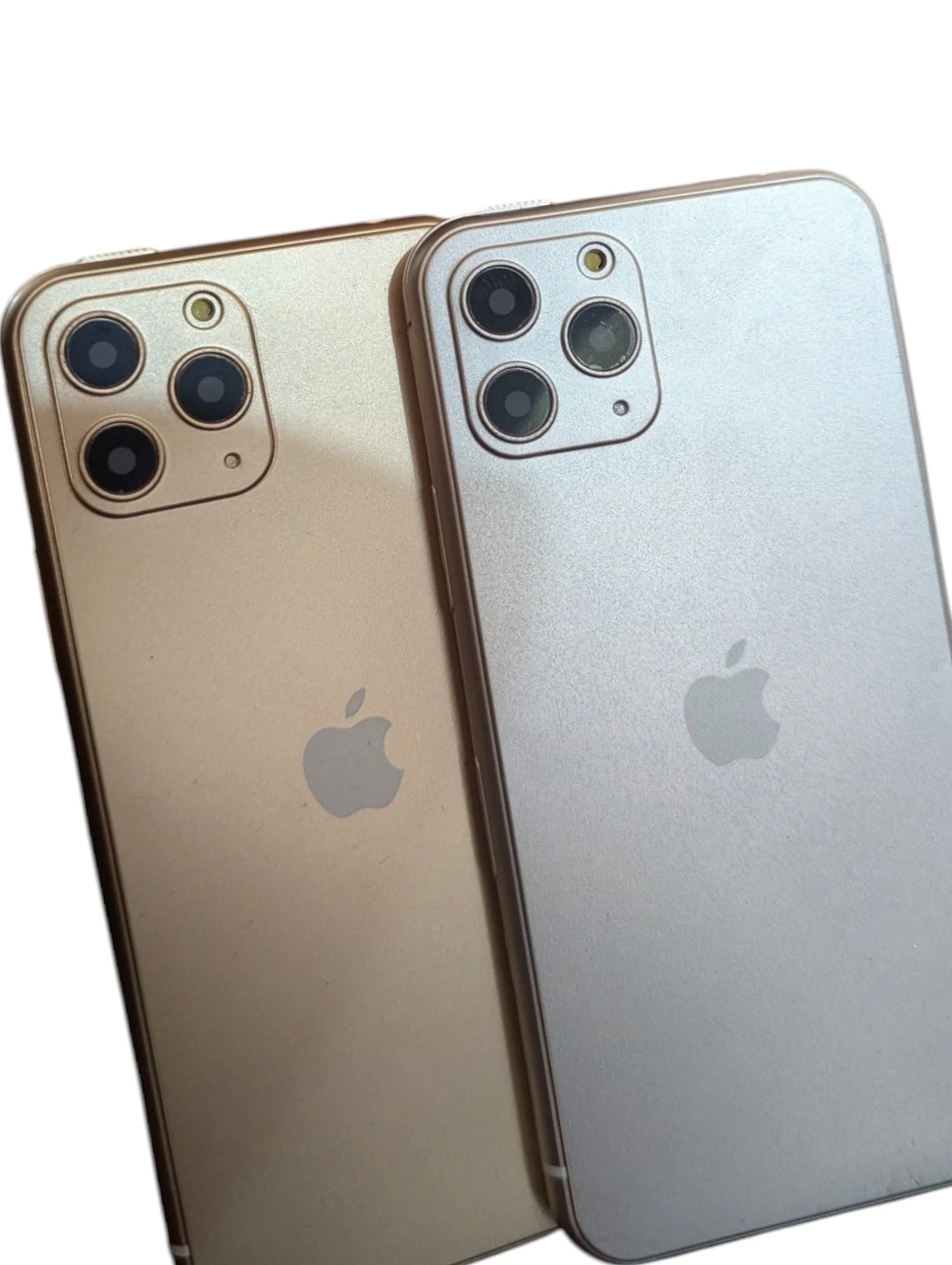 Two Apple iPhone smartphones Lighter, one gold and one silver, on a white background.