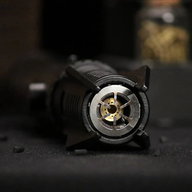Close-up of a mechanical component on a dark surface of a lighter