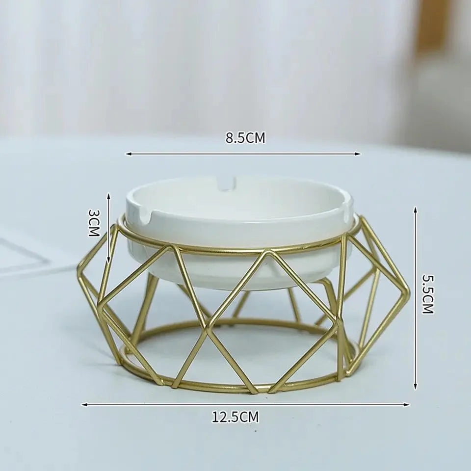 Metal Novelty ashtray with 8.5cm Bowl Voulum 3cm of bowl Hight and with metal frame of 12.5cm voulum and 5.5cm hight of this 