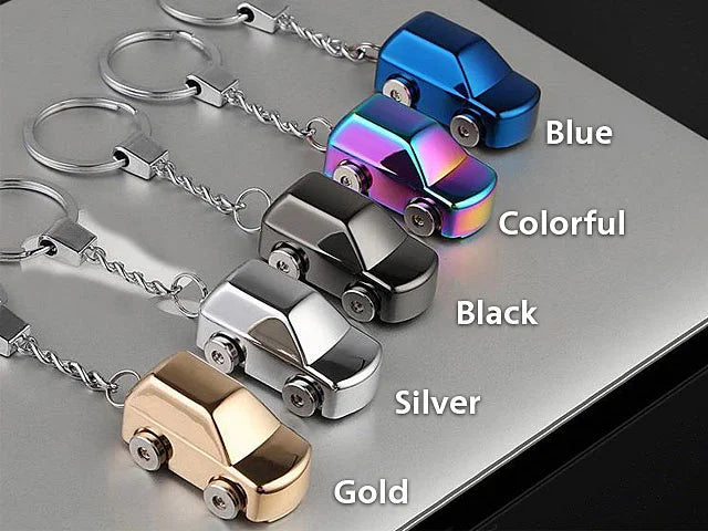 Car-shaped keychains Lighter in various colors on a gray surface