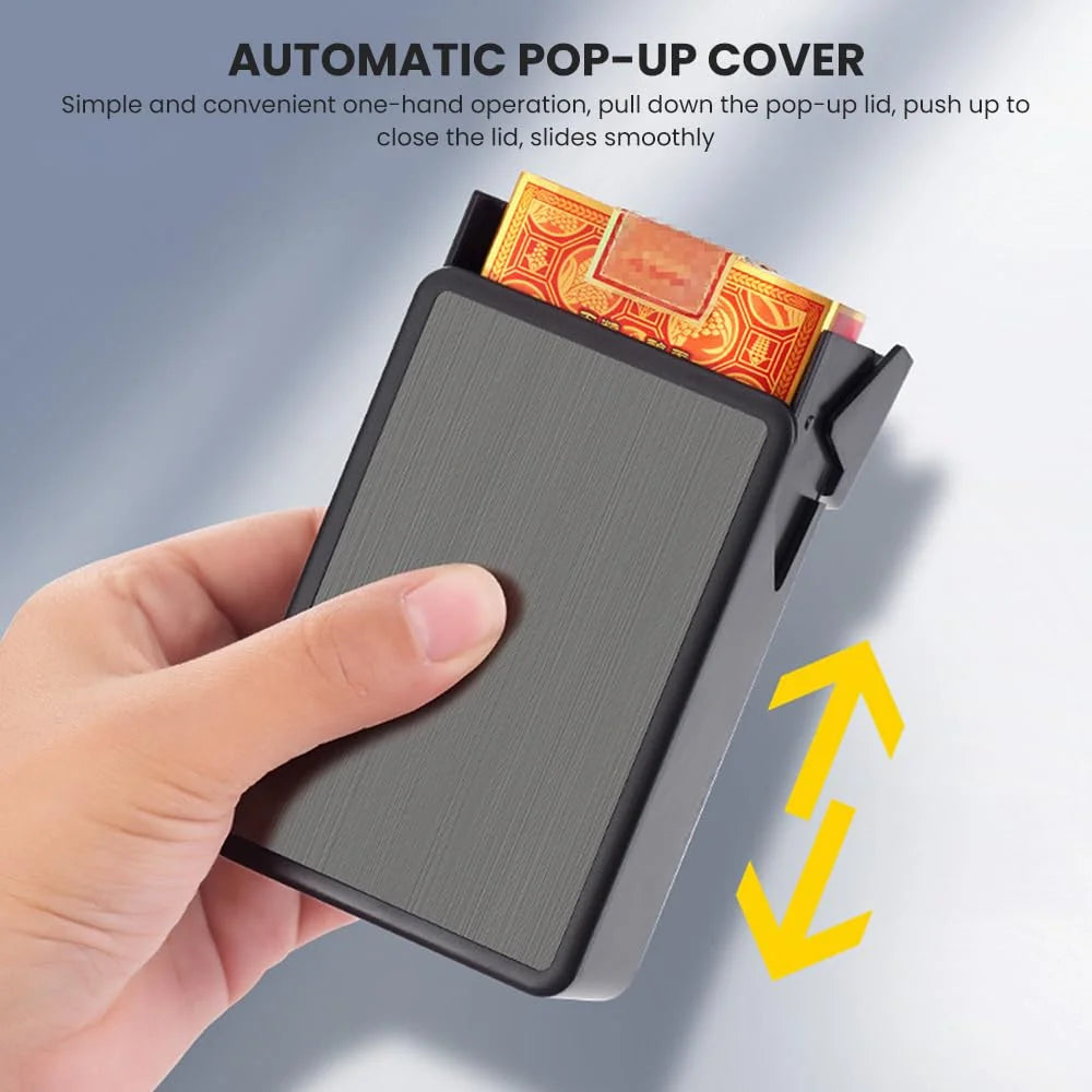 Hand holding a cigarette case with an automatic pop-up cover, showing its use.