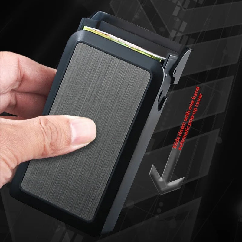 Hand holding a black cigarette case