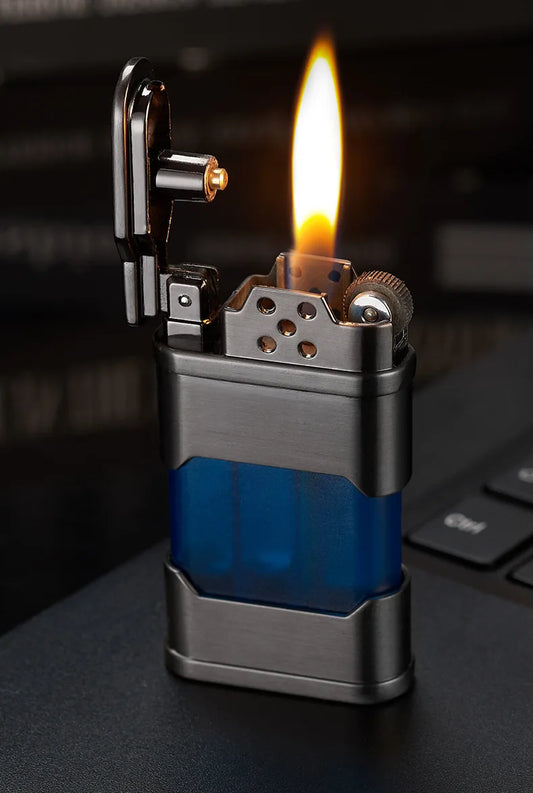Lighter with blue accent and flame on a dark background