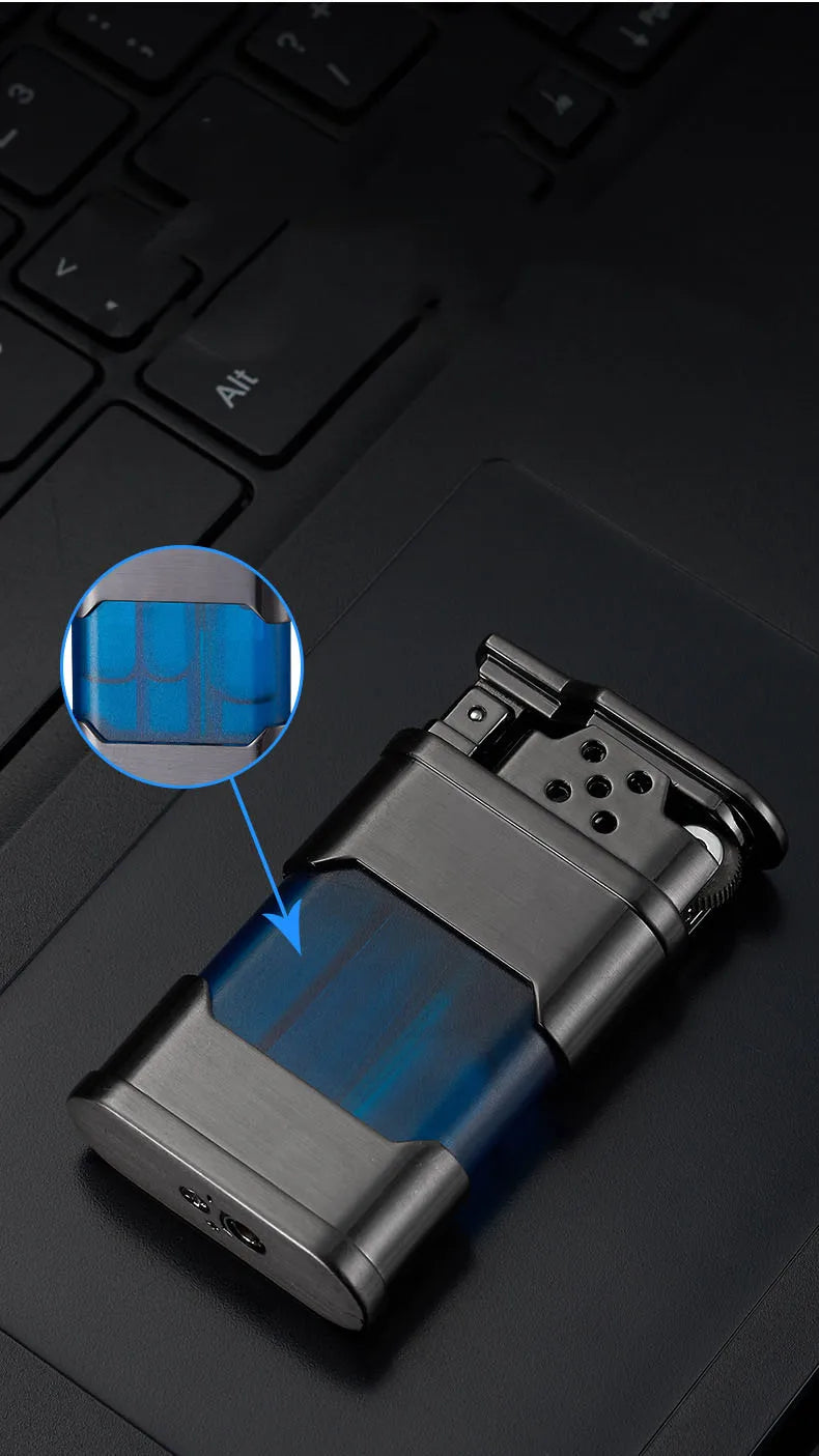 Metallic lighter with blue flame indicator on a dark surface
