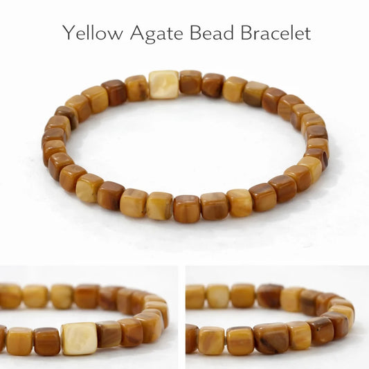 Yellow agate bead bracelet on a white background