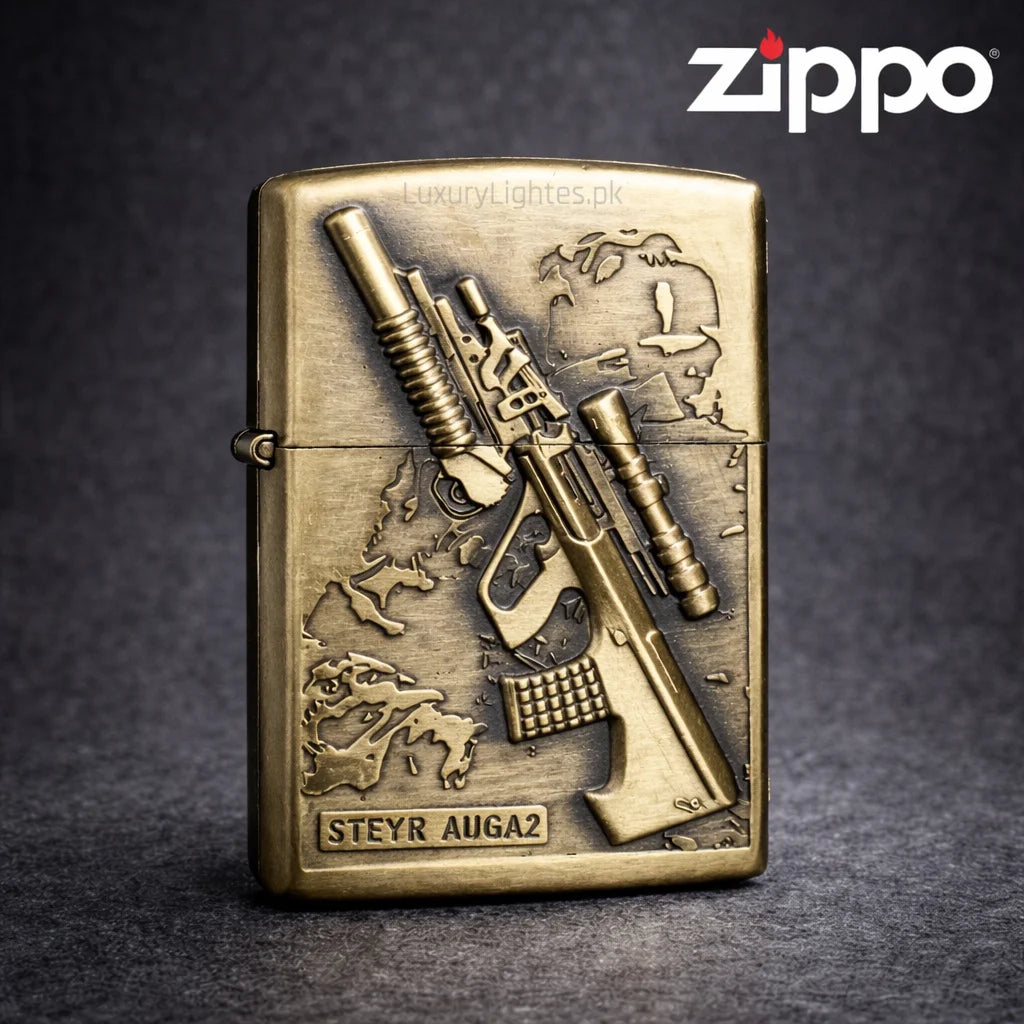 Bronze Zippo lighter with Steyr AUG A2 design on a dark background